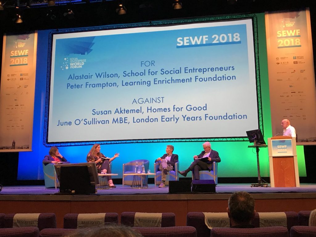 SSE CEO Alastair Wilson debates at SEWF 2018 on a panel with others on stage