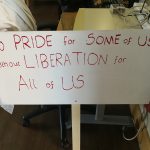 A protest banner reading "No Pride for some of us without liberation for all of us" - a quote from Marsha P Johnson