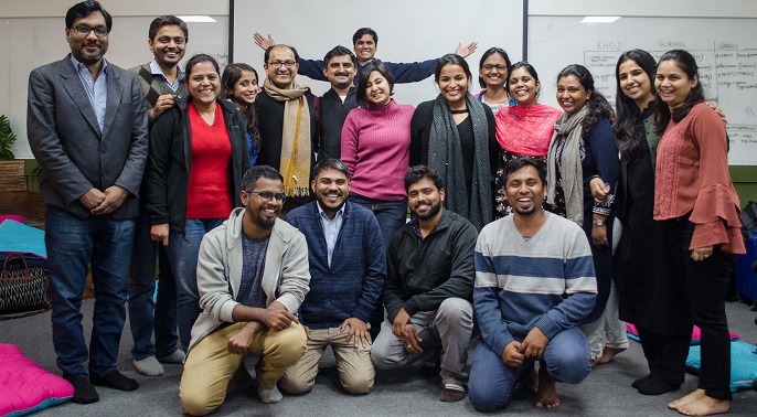 A large group of smiling people