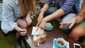 A group of people working around a table