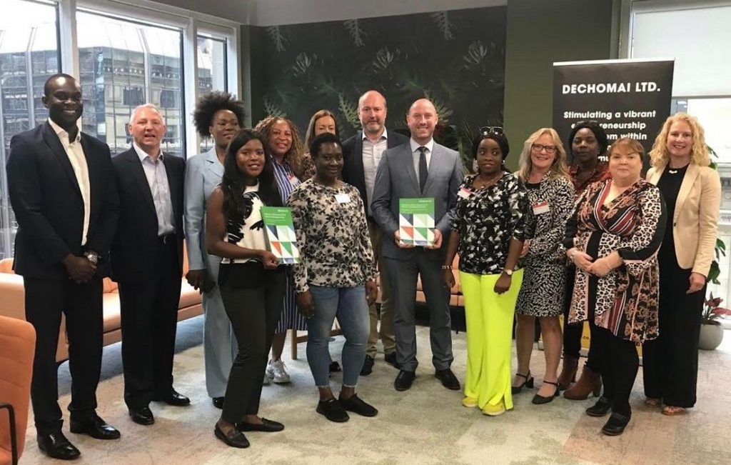 A group of SSE Black Social Entrepreneurs Programme participants at PwC UK Glasgow office with MSP Neil Gray